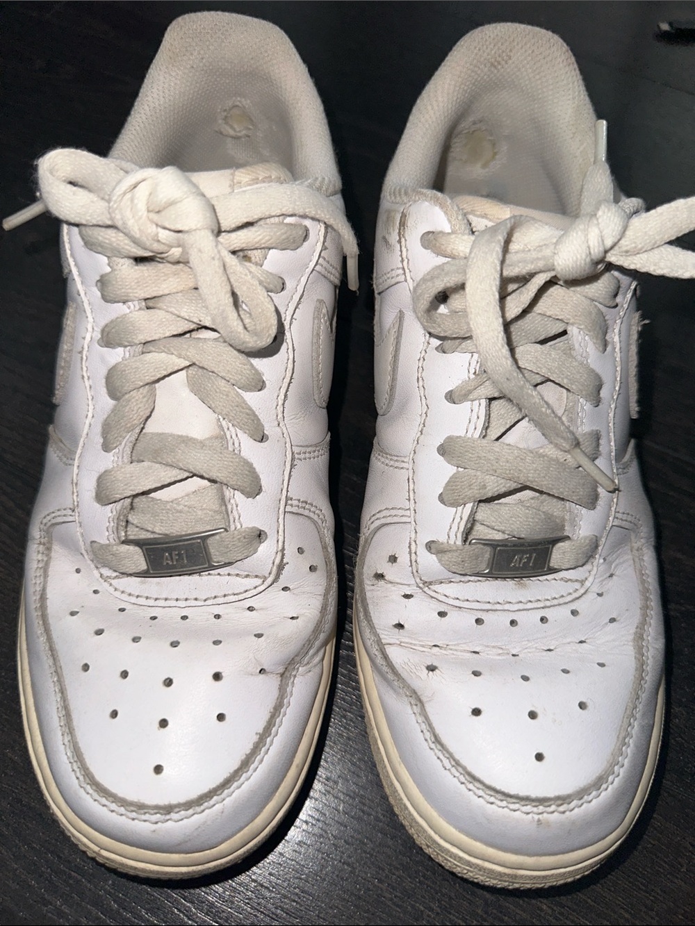 Worn Nike Women’s White Low-Top Sneakers